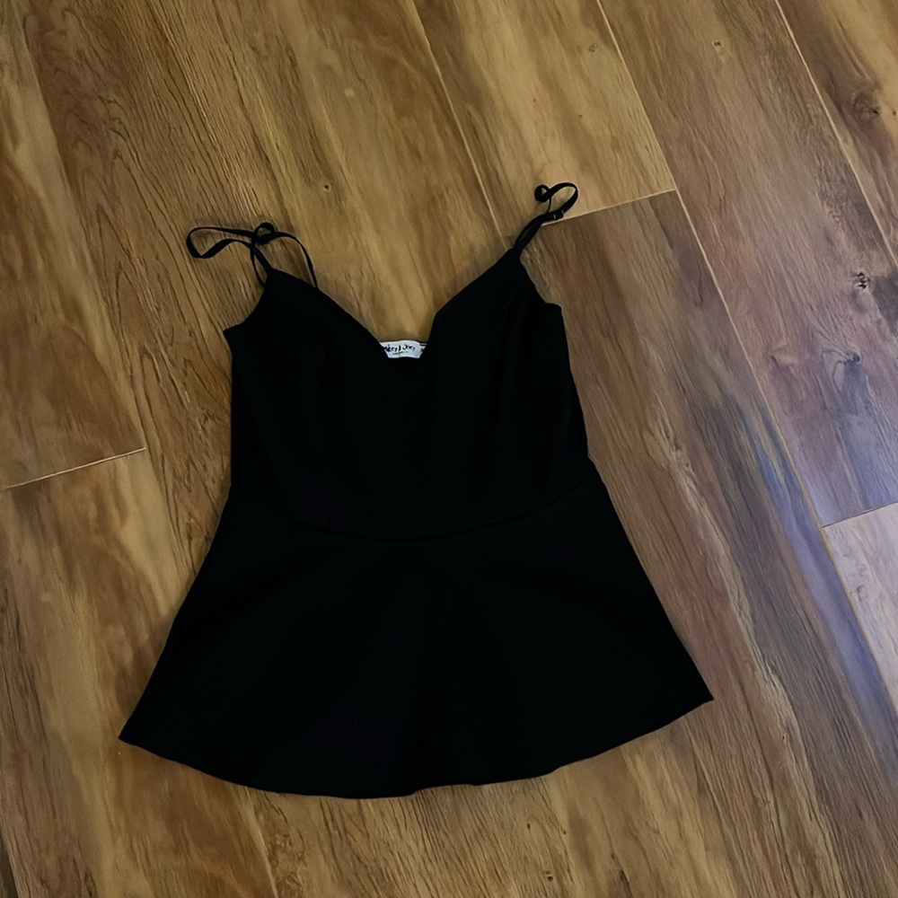Mikey & Joey Boutique Black Peplum "Going Out Top"- brand new condition size M.